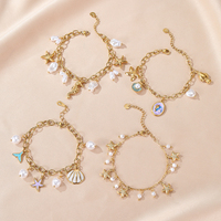 Ensemble de bracelets à breloques tropicales mixtes, en acier inoxydable plaqué or 18 carats, résistant au ternissement, avec breloques étoile de mer, hippocampe, coquillage et abalone, pour femme