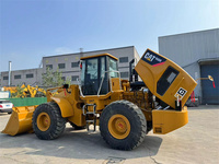 Chargeuse sur pneus Caterpillar CAT 966H d'occasion, modèle 2022, transmission 4x4, chargeuse frontale avec moteur et roulement, capacité de charge nominale de 6 tonnes