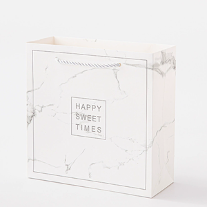 Ready-made INS-style white marble-patterned gift <b>bag</b> high-end ribbon handbag packaging <b>bag</b> color-printed paper <b>bag</b> with bow tie - Product Image 2