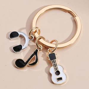 Instrumento Musical violín notas teclado <span class=keywords><strong>Piano</strong></span> auriculares llavero moda esmalte encanto llavero lindo llavero - Product Image 6