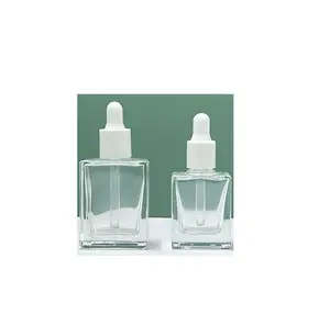 Botella de aceite esencial cuentagotas de vidrio plano cuadrado de 10ml y 15ml