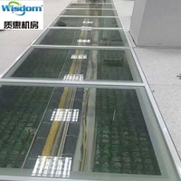 Sala de exposición suelo elevado de vidrio transparente