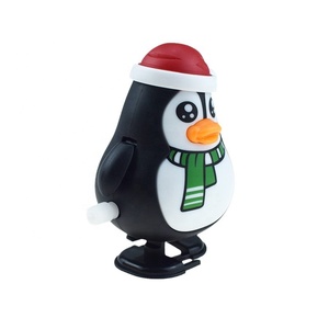 Wholesale Plastic Winding Chain Can <b>Walk</b> Christmas Penguin Clockwork Red Hat Doll <b>Toy</b> 7*5cm Christmas Gift - Product Image 3