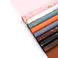 Papier d'emballage imperméable de luxe imprimé marbre 58xcm à prix avantageux pour fleuristes (vente en gros)