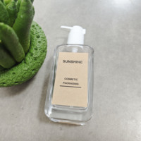 Botella de Aceite Corporal de vidrio de lujo de 5oz aceptada por OEM/ODM con bomba para el cuidado de la piel Embalaje de cuidado de la piel de forma plana para crema facial