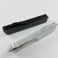 Couteau de camping portable à double lame rainurée Wjs-ut Dalong (noir et argent bicolore) avec lame à bouton-poussoir et manche usiné avec précision par CNC
