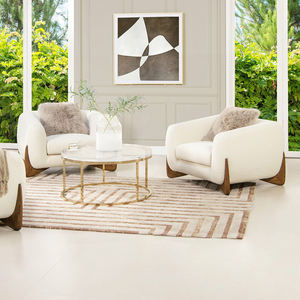 كرسي بذراع استرخاء أبيض بنمط اسكندنافي حديث منجد على الطراز الاسكندنافي - Product Image 1