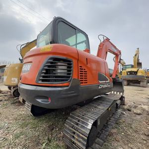 Mini-excavatrice sur chenilles hydraulique Doosan DX60 d'occasion, 6 tonnes, moteur Yanmar, pompe à engrenages 2024, conception compacte, construction urbaine - Product Image 1