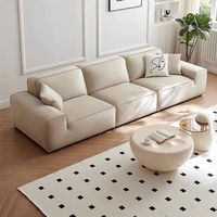 Ensemble de canapé en cuir crème de Style italien moderne Simple grand petit espace rangée droite lumière luxe maison salon chat éponge