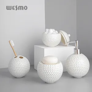 Simple modern luxury round shape golf-like porcelain bathroom accessories set ceramic bathroom set soap dispenser