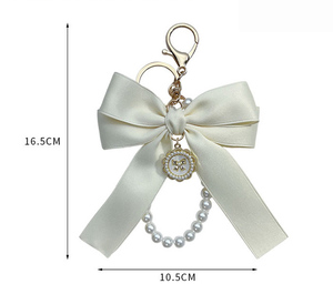 Porte-clés élégant avec nœud et perles pour femme, breloque de sac, support de clés de voiture avec pendentif, porte-clés féminin en soie - Product Image 6