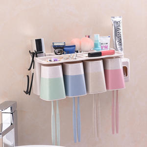 Portacepillos de dientes ecológico con 4 vasos, montaje en pared sin taladro, diseño moderno para uso familiar - Product Image 1