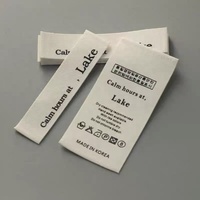 Usine personnalisé pas cher prix coton lavage étiquette imprimé doux cou vêtements étiquettes en coton nom de marque haute qualité étiquettes d'origine