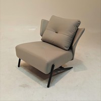 Fauteuil lounge moderne en tissu, velours doux, structure intérieure en fer et pieds en acier au carbone noir.