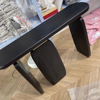 Table d'entrée contemporaine moderne en bois massif noir lumière de luxe arc silencieux de style chinois simple pour salon hôtel