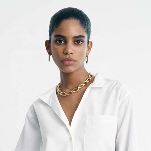 2025 Nueva alta calidad delicada joyería de latón de moda 18K oro espiral rayas en forma de U aro París pendientes huecos - Product Image 3