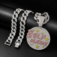 Cadena cubana de aleación de zinc con diamantes de imitación y colgante redondo hecho a mano para hombre, estilo hip hop y streetwear.