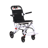 Fauteuil roulant de voyage pliable et portable, chaise de transport compacte avec frein à main pour l'aéroport, les courses et l'utilisation quotidienne en extérieur