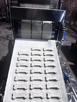 Biscuit rotatif à grande échelle en forme d'os pour chien faisant des biscuits Machine à craquer les noix Ligne de production de biscuits mous