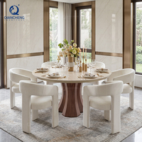 Ensemble de table à manger ronde en pierre frittée avec piétement en fer grain de noyer sabloné pour 6 à 8 personnes, idéal pour villa, restaurant, usine