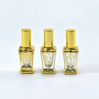 Vente en gros Récipient de parfum en verre doré délicat de 10 ml, cylindrique et portable, emballage de bouteille