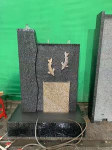 Cascada de granito negro con peces de piedra montados <span class=keywords><strong>en</strong></span> la <span class=keywords><strong>pared</strong></span> de la cascada para jardín interior o exterior - Product Image 2