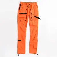 Topman skinny belted cargo trousers with side panel in orange  ASOS