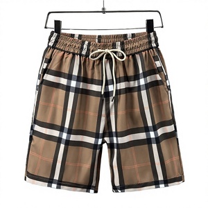 Shorts en toile respirants pour hommes, taille mi-haute, tissés, unis, décontractés, pour l'été et la plage, avec cordon de serrage – Vente en gros - Product Image 3
