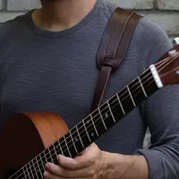 संगीत वाद्य सामान गिटार का पट्टा पु चमड़े कस्टम लोगो हस्तनिर्मित गिटार डोरी
