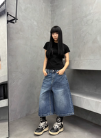 Marque rétro américaine Pantalon trois-quarts pour femmes Haut décontracté Denim Jeans Bouton Décoration Été Vintage Style Whisker Straight