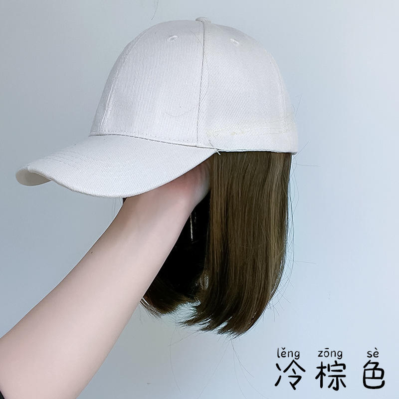 Beige hat, collarbone-length hair - cool brown