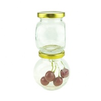 Vente en gros 200ml/200g mini bocal en verre transparent étain couvercle en or sculpté 7OZ bouteille alimentaire pour confiture miel épices condiments conteneur pivotant