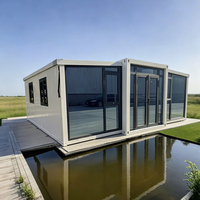 Maison conteneur préfabriquée moderne, portable, extensible et respirante, de forme carrée, tout-en-un, pour bureau, entrepôt ou habitation modulaire