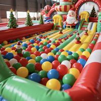 Château gonflable géant de Noël avec toboggan et luge de Père Noël, combo de château gonflable pour l'intérieur et l'extérieur