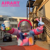 Astronaute gonflable accrocheur avec signe de paix – Décoration et mascotte qui se démarquent pour tout événement