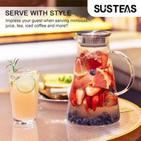 Vente en gros de pichet d'eau froide triangulaire en verre de style américain à haute teneur en borosilicate de conception simple résistant aux hautes températures