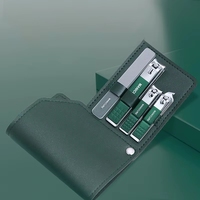 Kit de manucure et pédicure professionnel de luxe portable de haute qualité en acier inoxydable avec logo personnalisé et sac en cuir PU
