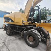 En stock, excavatrice sur pneus d'occasion CAT M320D2 de 19,5 tonnes, excavatrice sur pneus Caterpillar d'occasion à vendre