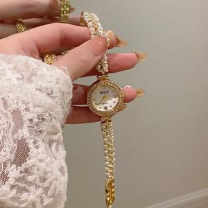 Orologio al quarzo da <span class=keywords><strong>donna</strong></span> con diamanti <span class=keywords><strong>di</strong></span> <span class=keywords><strong>lusso</strong></span> Reloj De Mujer Frach stile lega tempestato <span class=keywords><strong>di</strong></span> perle orologio rotondo al quarzo - Product Image 3