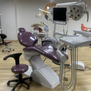 Sedia odontoiatrica orale elettrica con tavolo di trattamento accessori completi per macchine per uso transfrontaliero all'estero - Product Image 1