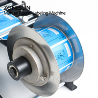 Machine d'étiquetage manuelle facile et simple ZONESUN ZS-50 pour contenants en plastique, canettes de bière, huiles essentielles, bouteilles rondes