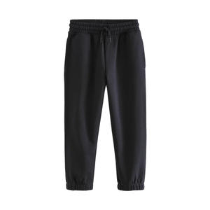 Jogging pour hommes grandes tailles avec coupe décontractée et tailles étendues, conçues pour un confort optimal pour les personnes corpulentes et les grandes tailles lors de la détente et des tenues décontractées. - Product Image 1