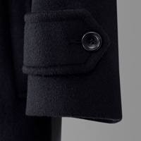 Nouveau manteau long noir pour femme, style minimaliste populaire, explosif, pour la chaleur et la protection contre le vent