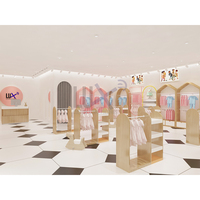 Estante de exhibición de tienda de ropa moderna para niños, decoración de diseño de tienda de ropa para niños