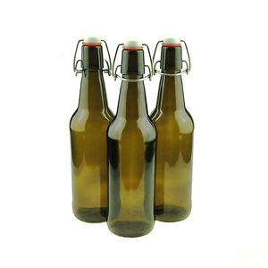 Bouteille de bière en <span class=keywords><strong>verre</strong></span> ambré mat de 50 cl (500 ml) avec bouchon en caoutchouc et clip en <span class=keywords><strong>plastique</strong></span>, emballée en carton - Product Image 1