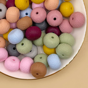 Cuentas de silicona con relieve de grado alimenticio de 12 mm para juguetes de dentición para bebés y manualidades. - Product Image 1