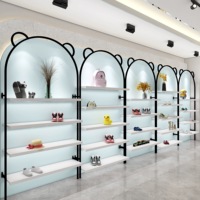 Étagère murale blanche multi-niveaux avec cadre en métal noir, étagère d'exposition pour magasin de vêtements pour enfants