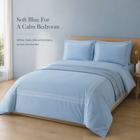 Parure de lit brodée bleu calme pour chambre d'amis et location de vacances avec bordure de taie d'oreiller à motif chaîne