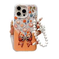 Coque de téléphone de luxe créative en élastomère thermoplastique, motif nœud floral, ornée de diamants et de perles, avec sangle chaîne pulvérisée