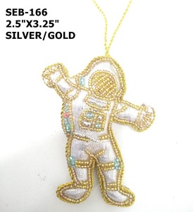 handmade beaded astronaut Christmas <b>ornament</b> <b>silver</b> gold beaded astronaut wall hanging manufacturer supplier - Product Image 1